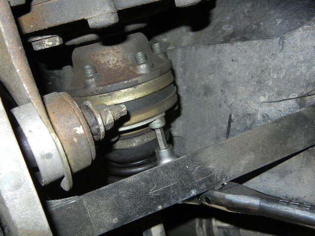 Porsche 996 Turbo unbolting the front axle shaft Porsche 996 Turbo unbolting the front axle shaft